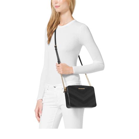 michael kors crossbody jet set black|Michael Kors jet set item.